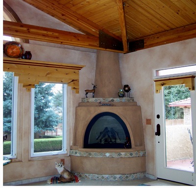 Home remodels adobe fireplace
